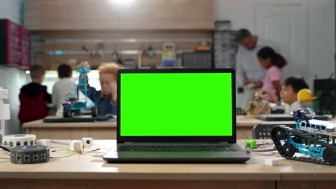Laptop computer green screen in classroom background Stock Footage 220632504