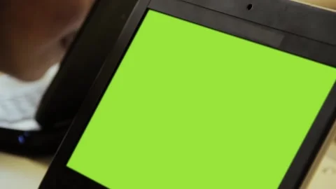 Laptop Computer with Green Screen in Sch... | Stock Video | Pond5