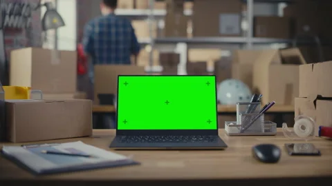 Laptop Computer with Green Screen in War... | Stock Video | Pond5