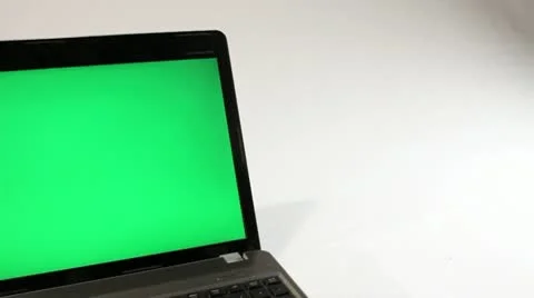 LAPTOP COMPUTER WITH GREENSCREEN TRACKING SHOT Stock Footage 10727629