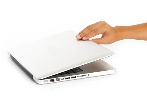 Laptop computer half way open displayed from the side view Stock-Fotos