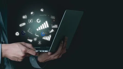Laptop computer is in the hands of businessman. Stock Photos