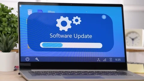 Laptop Computer Installing a Software Update Stock Footage 115358520
