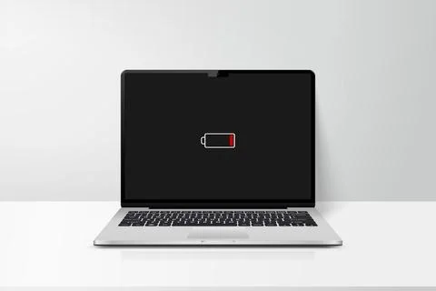 Laptop computer with low-battery warning icon Illustrazione stock