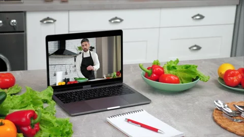 Laptop computer with man chef food blogger tells teaches housewife students Stock Footage 164462867
