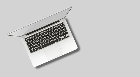 Laptop computer mock up with empty blank white screen isolated on grey back.. Stock Photos