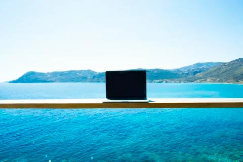 Laptop Computer Mock Up with Skiathos on the Background Stock Photos