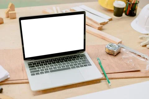 Laptop Computer Mockup Blank White Screen on Engineer Architect Workstation.. Stock Photos