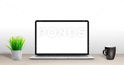 Laptop computer mockup on office desk PSD Template