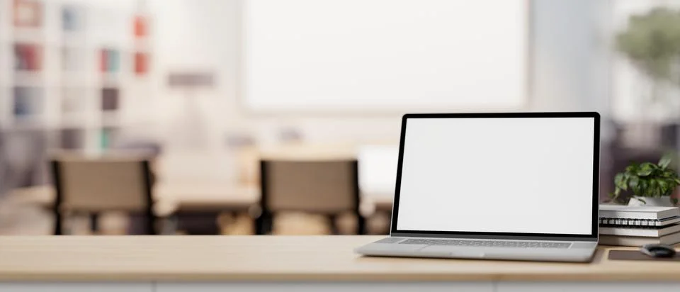 A laptop computer mockup on a table with a blurred background of a contempo.. Stock Illustration