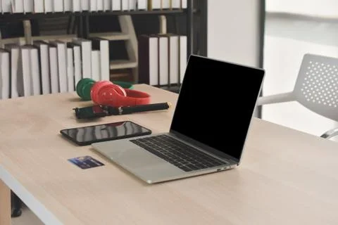 Laptop Computer Notebook on desk in office internet technology work online co Stock Photos