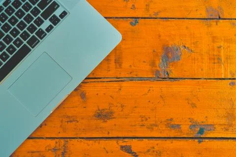 Laptop computer on office table background. Stock Photos