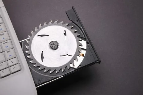 Laptop computer with an opened disc drive Stock Photos