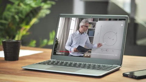 Laptop computer screen showing teacher online lecture class remote education Stock Footage 285511366