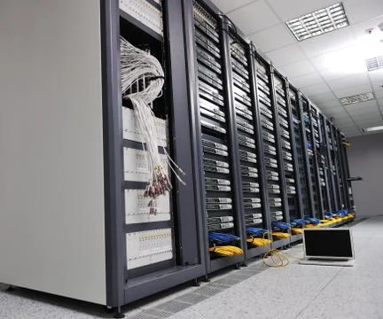 Laptop computer at server network room Stock Photos