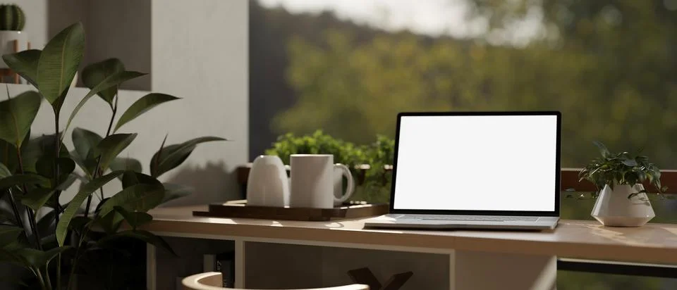 A laptop computer on a table on a beautiful and comfortable balcony with a .. Illustrazione stock