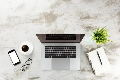 Laptop computer on table workspace top view Stock Photos