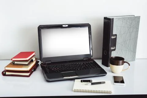 Laptop Computer on Top of Office Table of a Businessman Stock Photos