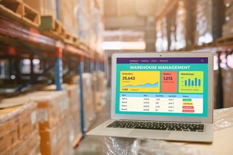 Laptop computer using online warehouse management system (WMS) software scr.. Stock Photos