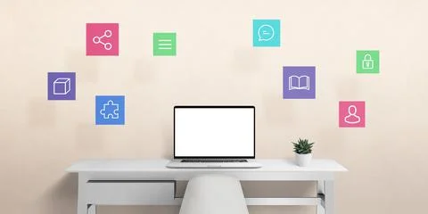Laptop computer on work desk with internet of things icons in air. Isolated s Foto stock