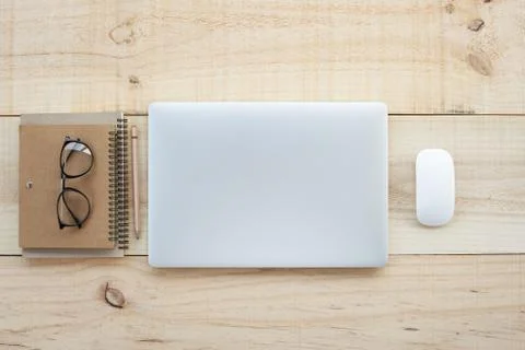 Laptop computer on work table top view Stock Photos
