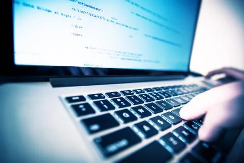 Laptop Computer Works. Web Programmer at Work. Photos