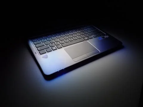Laptop in dark light Foto stock
