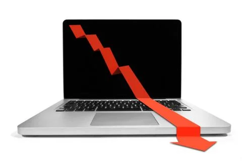 Laptop with declining chart Stock Photos