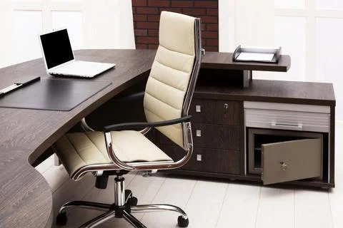 Laptop on desk Stock Photos