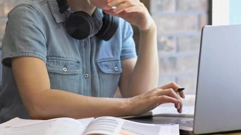 Laptop on desk student learning through computer. Online learning platforms Stock Footage 279566185