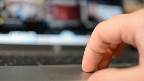 Laptop device. man's hand scroll youtube social media app on laptop screen. Stock Footage 302344945