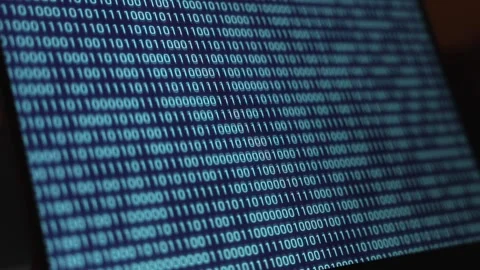 Laptop, digital screen with binary code, zero and one in blue. Video stock 276229403