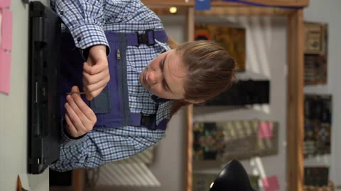 Laptop disassembling with screwdriver. Female engineer fixing broken computer in Video stock 232672656