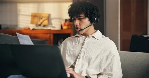 Laptop, document and man with headset for remote work, online help desk or .. 写真素材
