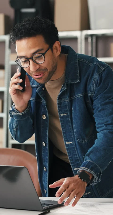 Laptop, documents and man with phone call in logistics for shipping, pricing Stock Footage 332048265