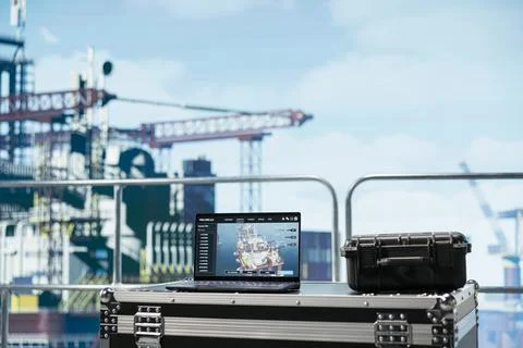 Laptop on drilling rig ship with software dashboard used for anomaly detection Stock Photos