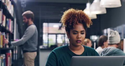 Laptop, education and black woman in library for learning students in college Stock Footage 221936976