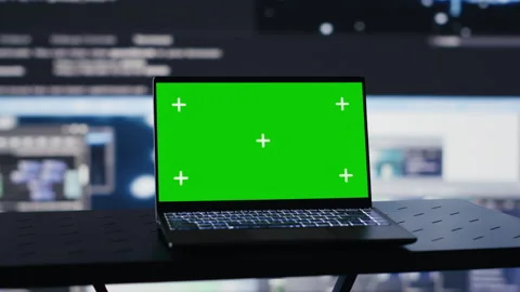 Laptop in empty space shows copy space screen surrounded by data Stock Footage 311081681