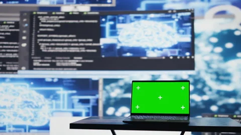 Laptop in empty space shows copy space screen surrounded by data Stock Footage 311082735