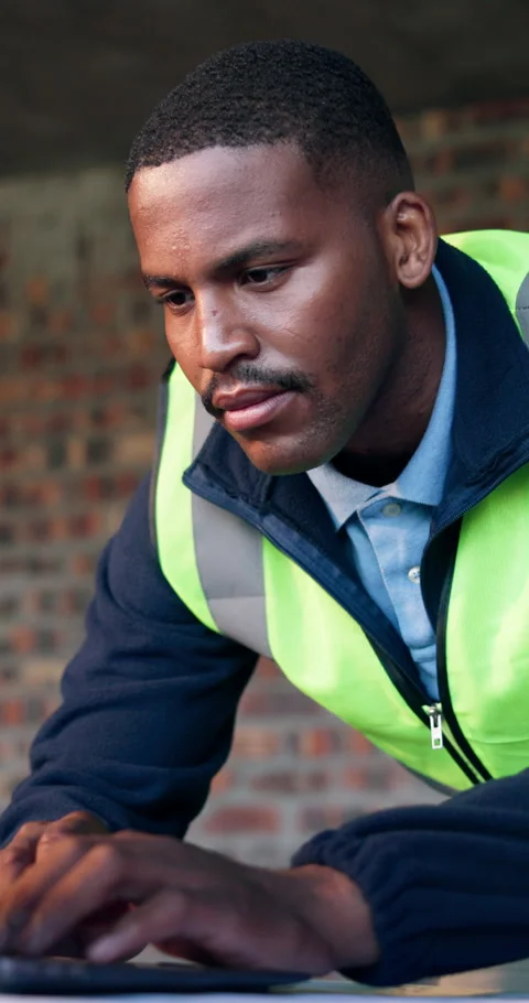 Laptop, engineer and reading with man on construction site for project Stock Footage 340978014