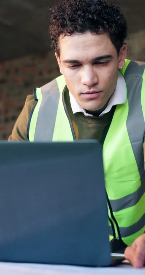 Laptop, engineer and research with man on construction site for project Stock Footage 340980997