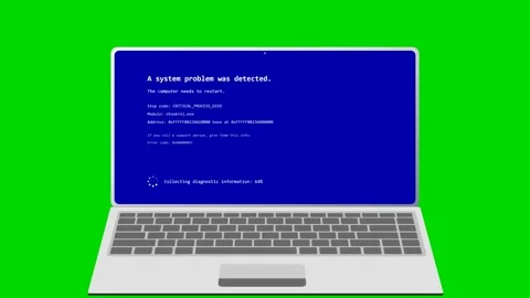 Laptop experiencing system crash and restart on green screen. 4K Video stock 341694486