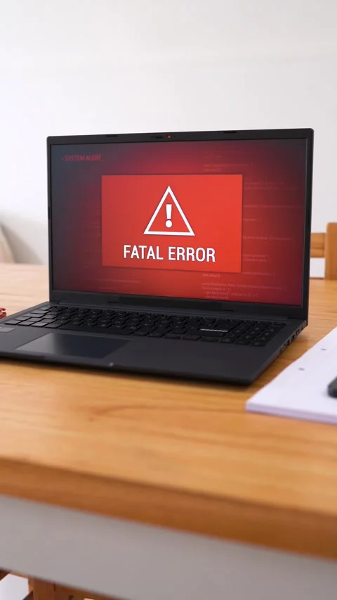Laptop with fatal error screen. System failure concept. Red screen glitching Stock Footage 306133567
