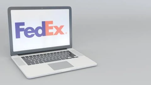 Laptop with FedEx logo. Computer technology conceptual editorial 3D rendering Stock-Illustration
