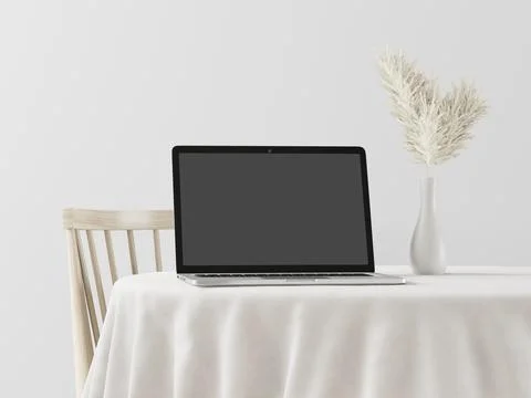 A laptop with a flower vase on the table Illustration