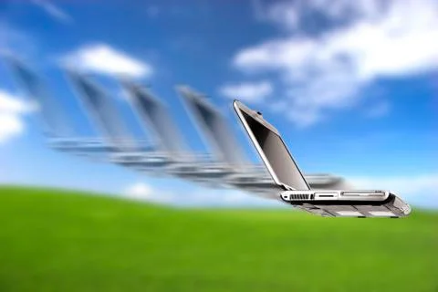 Laptop flying Illustrazione stock