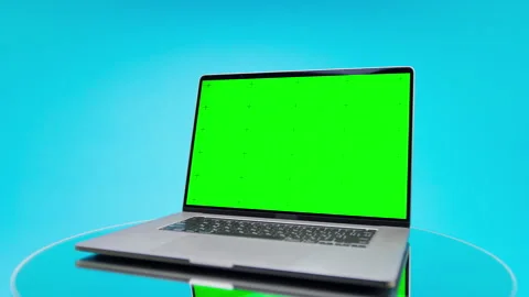 Laptop With Green Screen on Blue Background Stock Footage 339411390