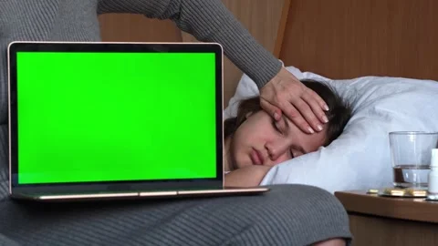Laptop green screen chroma key mock up close up, Mother with sick child girl Stock Footage 301893718