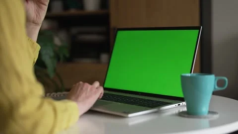 Laptop with green screen chroma key mockup for content replacement. Stock Footage 340326188