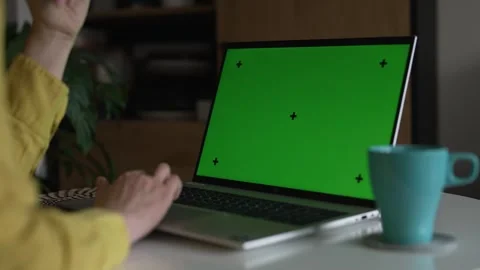Laptop with green screen chroma key mockup for content replacement. Stock Footage 340326256